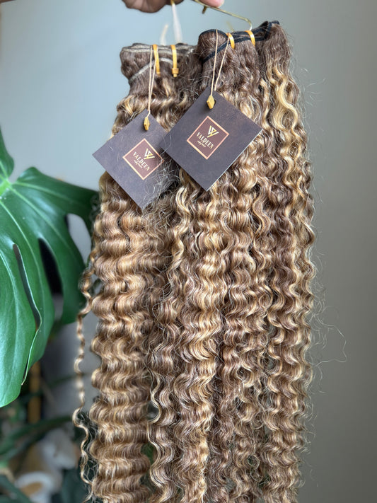 toffee curly hair in natural light
